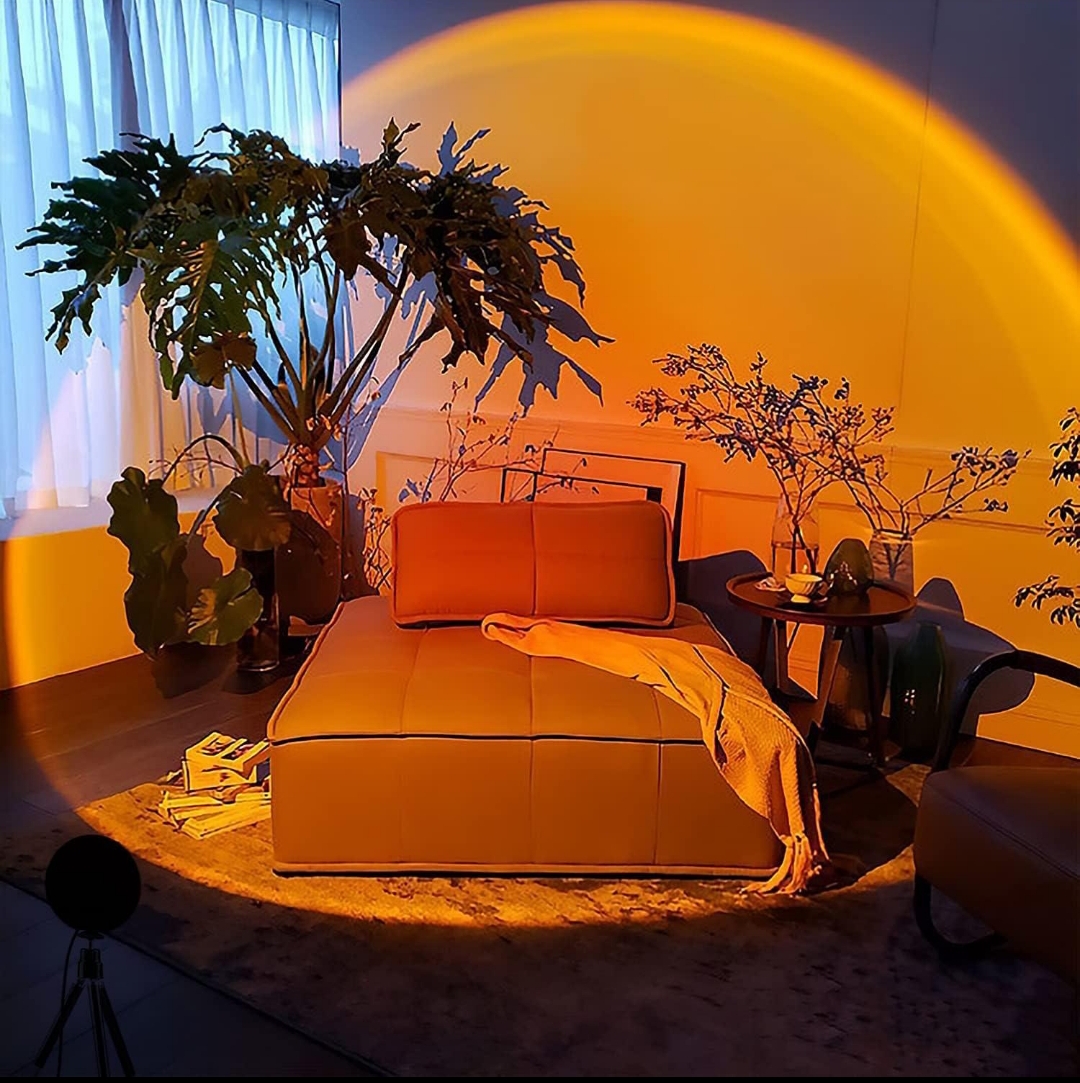 Sunset RGB projection lamp glowing in a warm living room